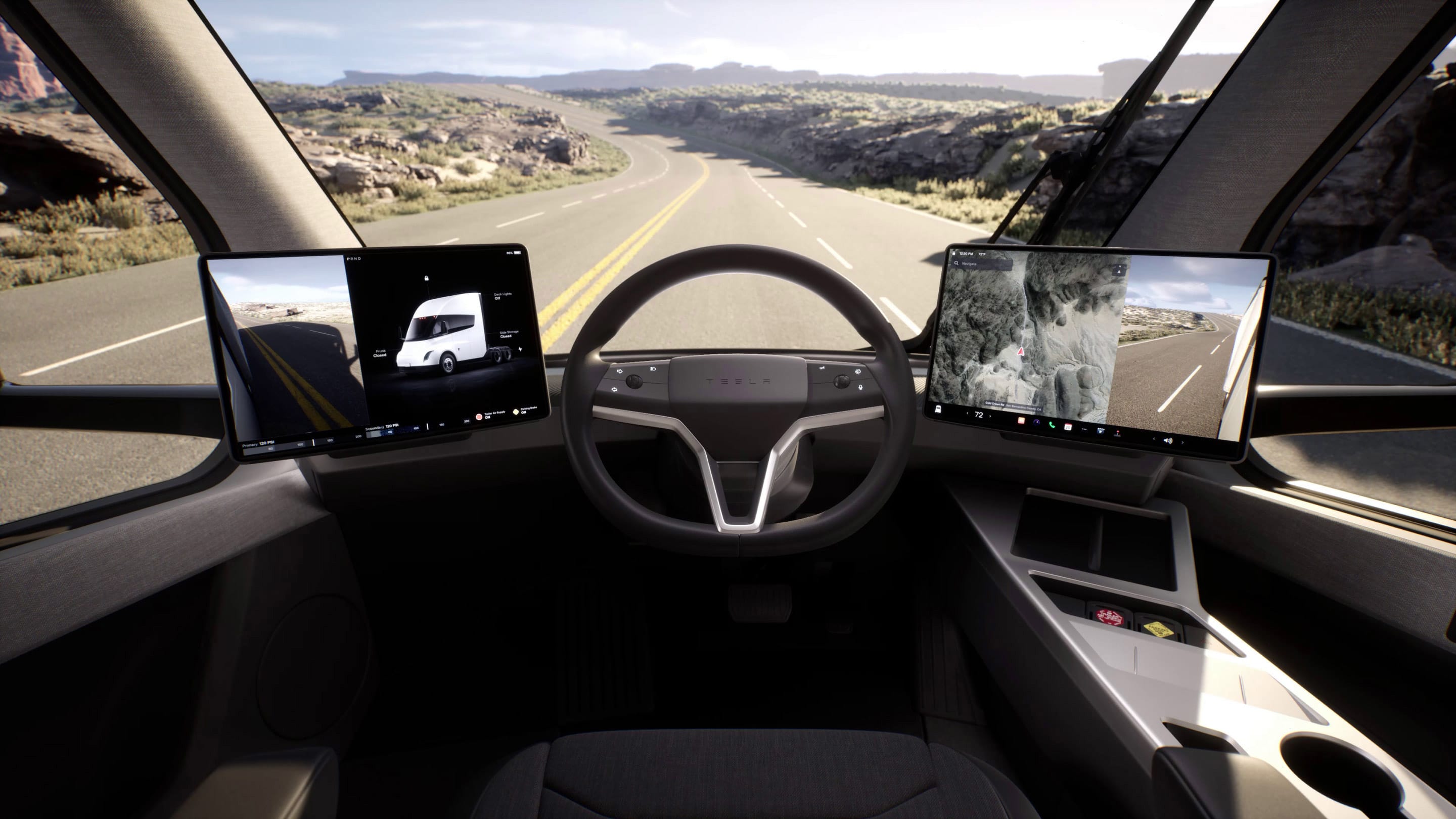 Driver's view of the interior cabin, steering wheel, dual touchscreens and the road ahead. 