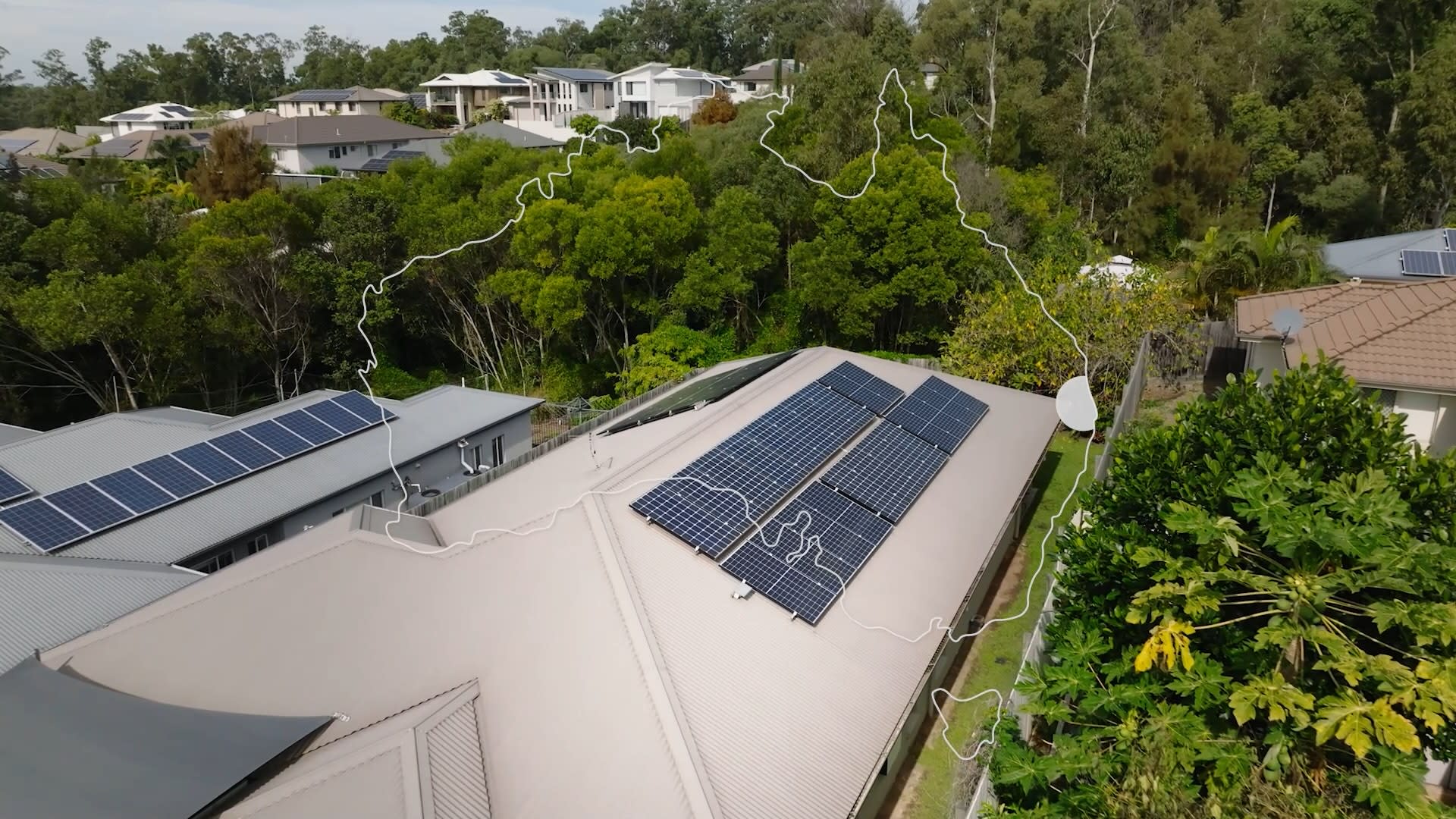 Aerial shot of a home with solar panels and Australia outlined