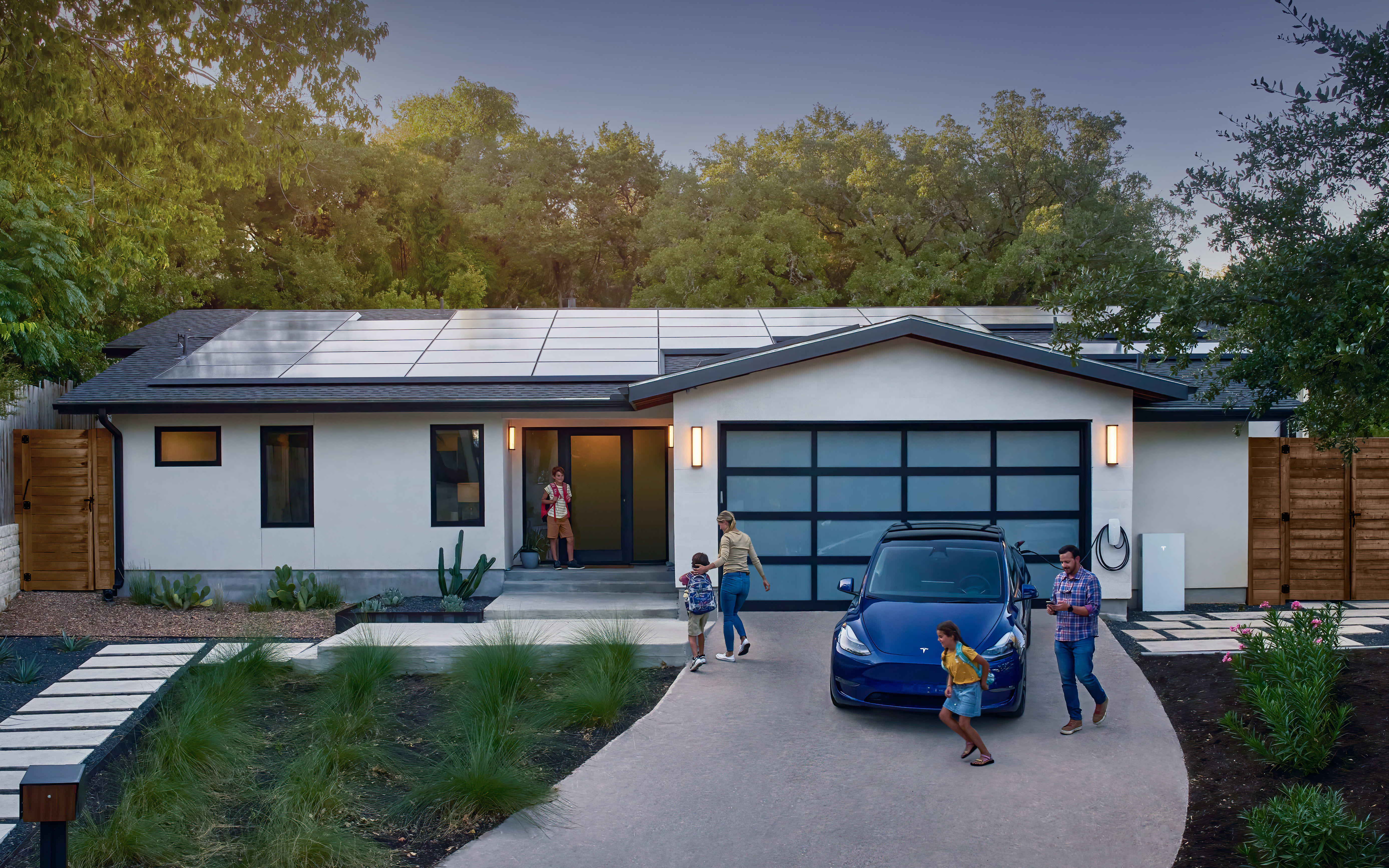 Home with solar panels and Powerwall