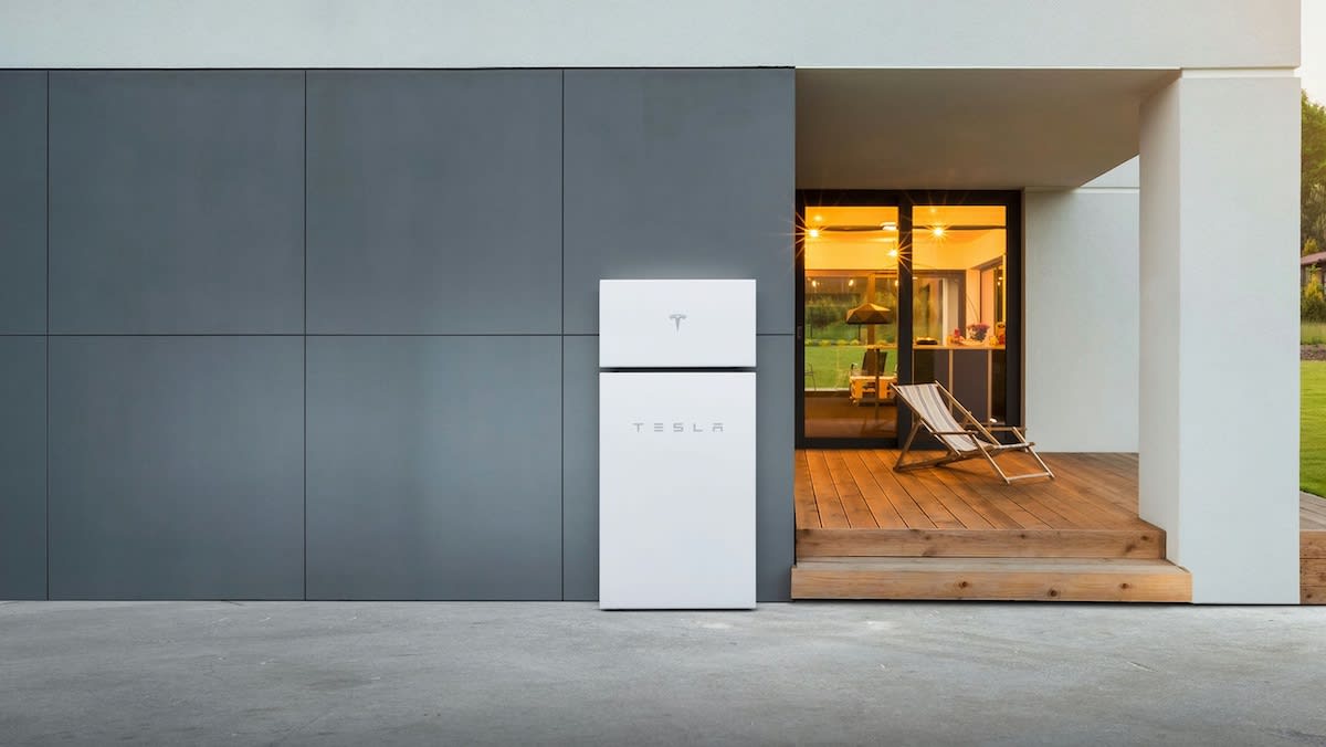 Powerwall+ Installed Outside of a Modern Home