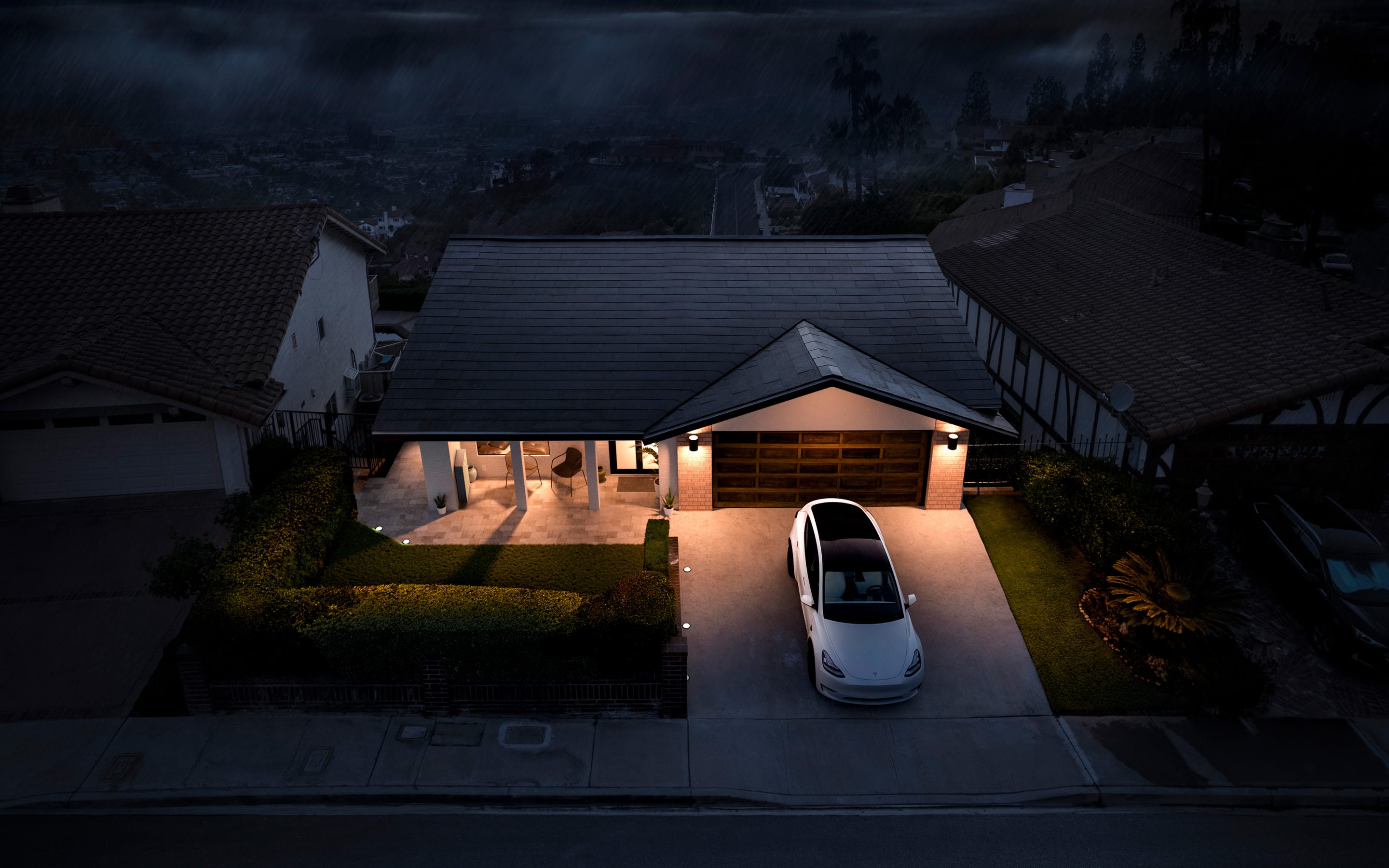 Solar Roof on single story home with white Model 3 in driveway