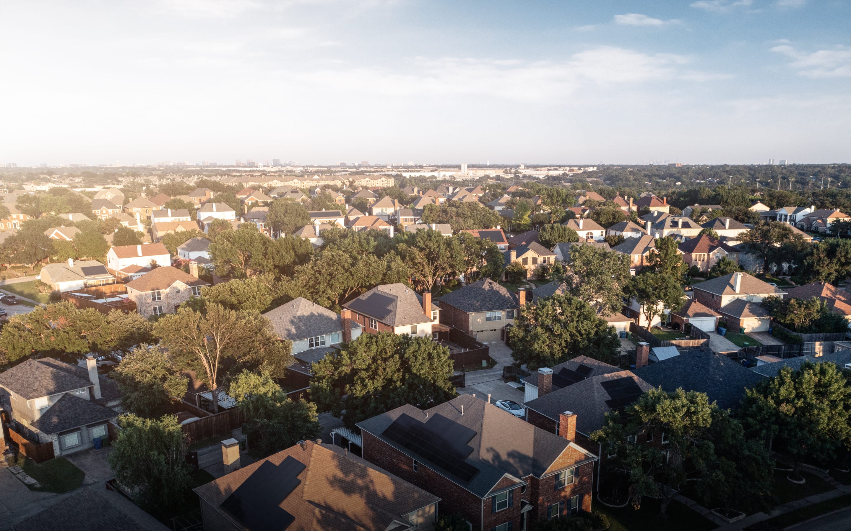 Ariel view of homes in Texas with solar panels