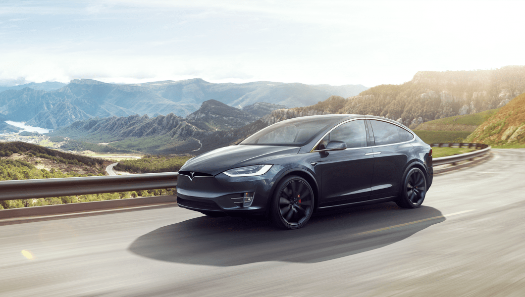 Model X driving on the road