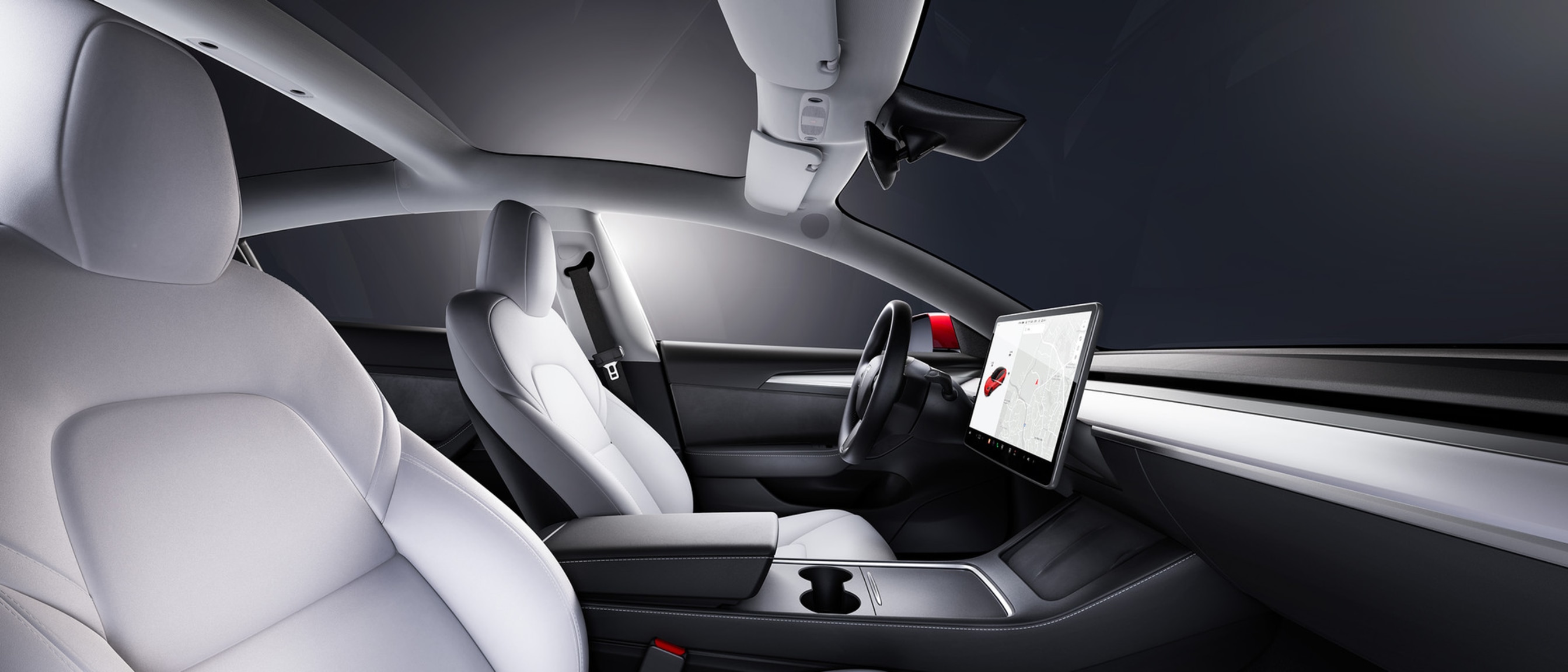 白色内饰款 Model 3 的前排座椅内视图