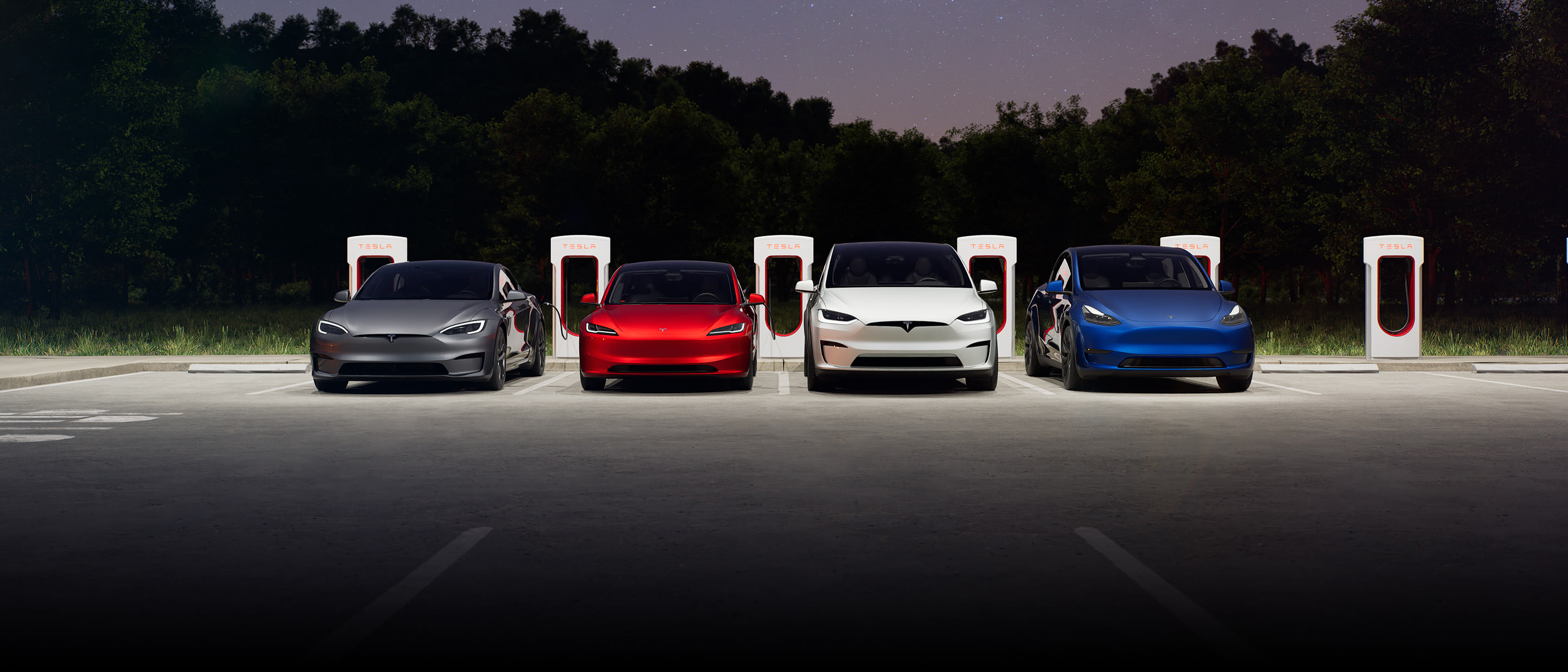 Tesla Model S, Model 3, Model X and Model Y at Supercharging site