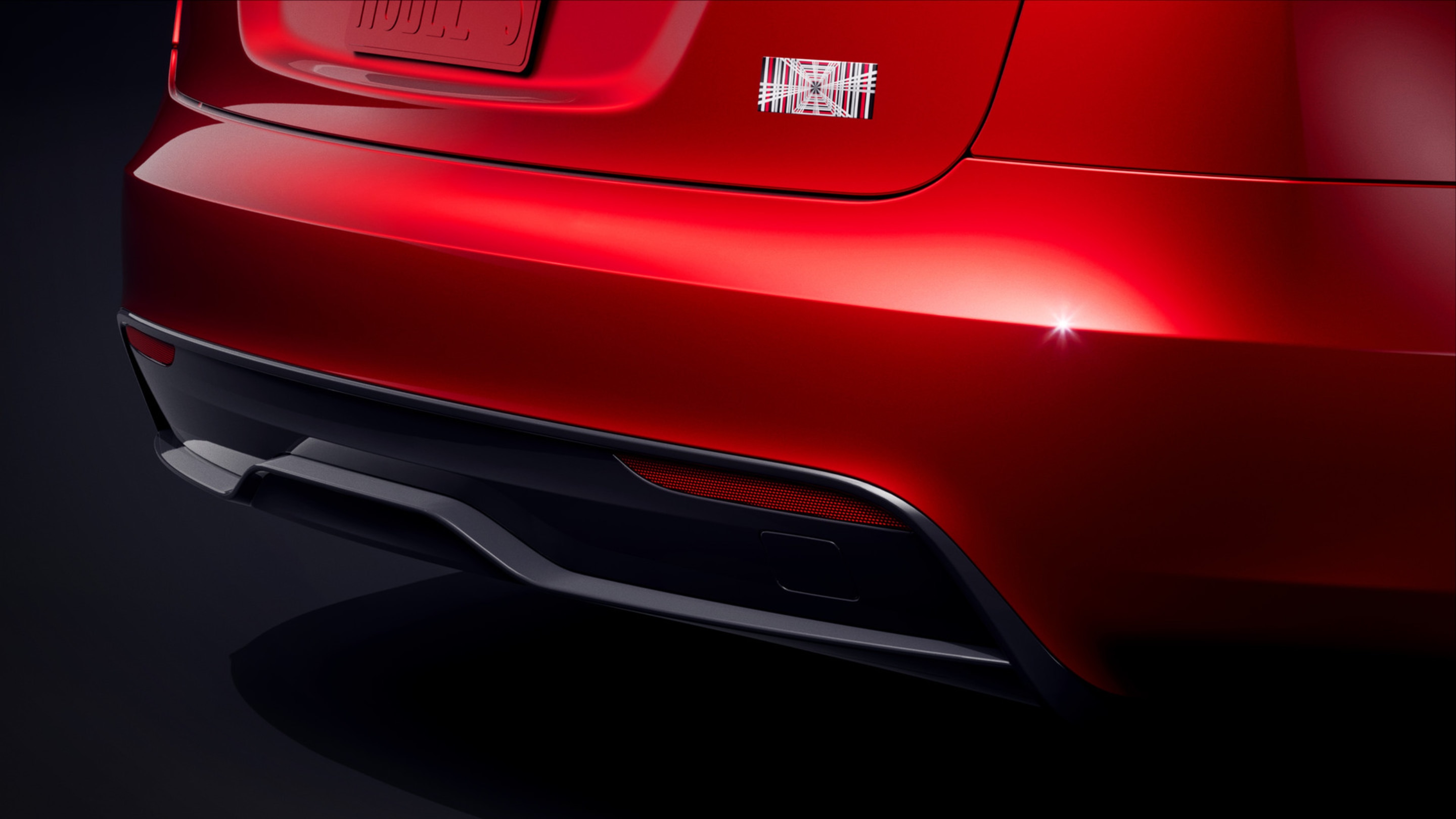 Vista da traseira do Model S em vermelho