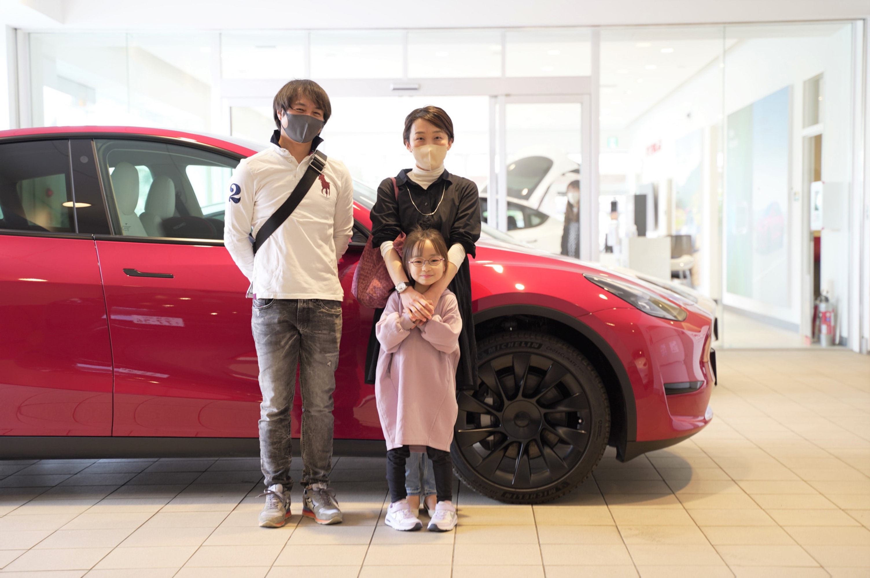 Family at Tesla store