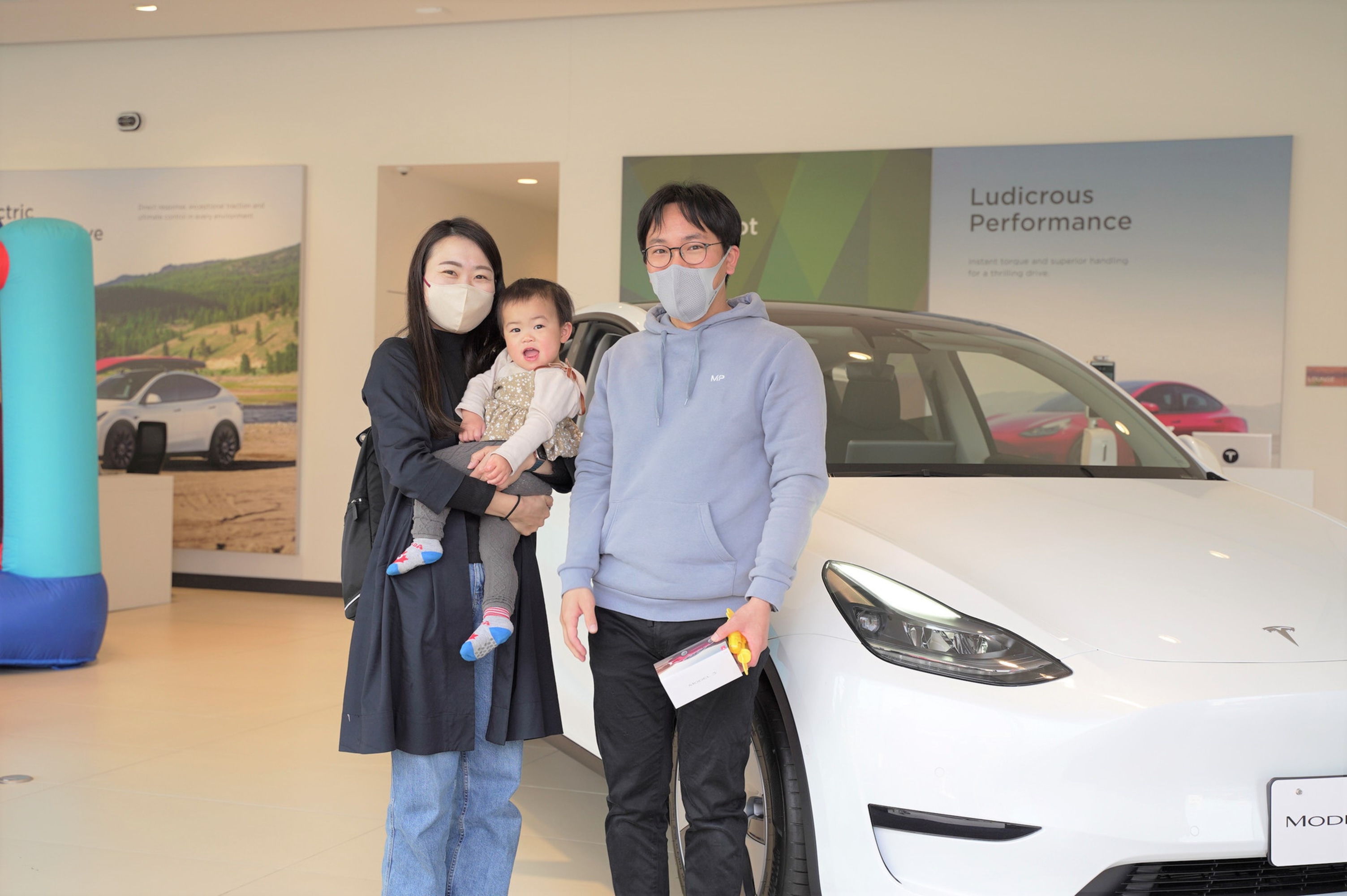 Family at Tesla store