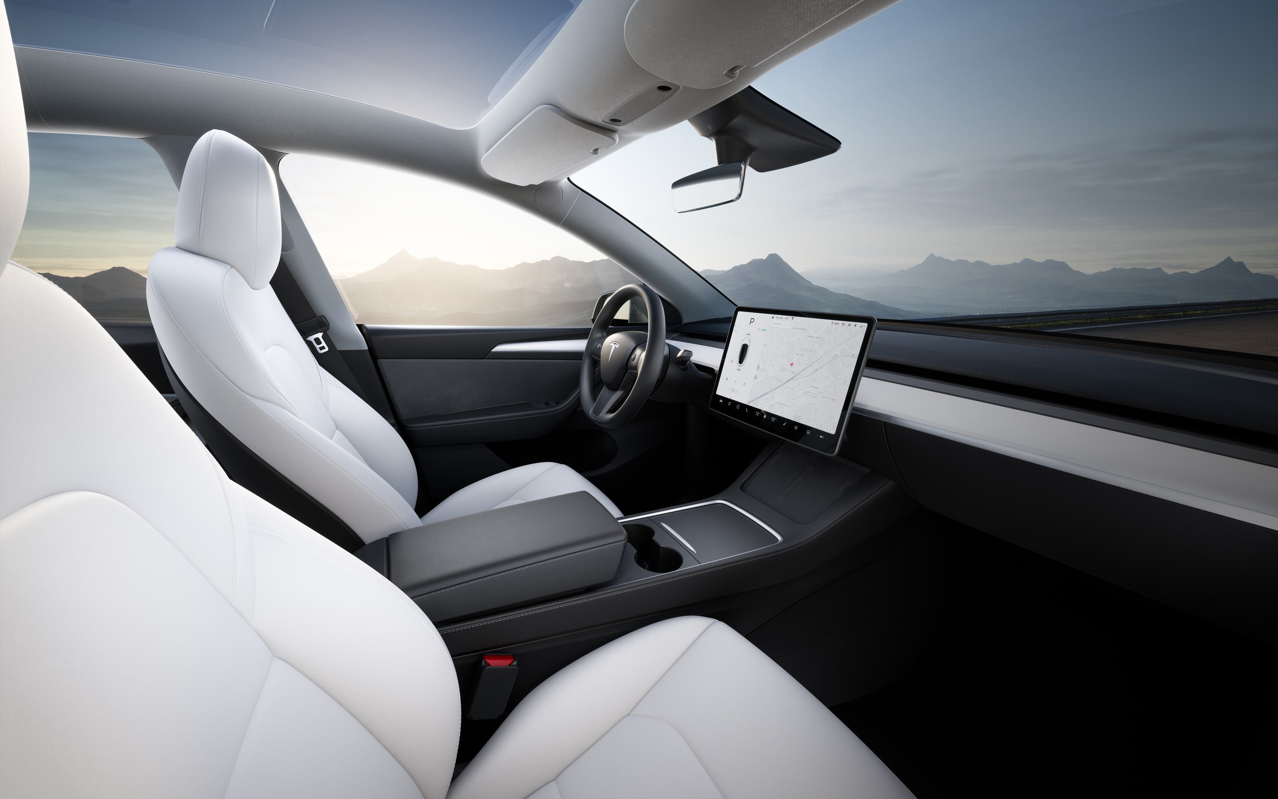 Side view of driver's seat, steering wheel and touchscreen