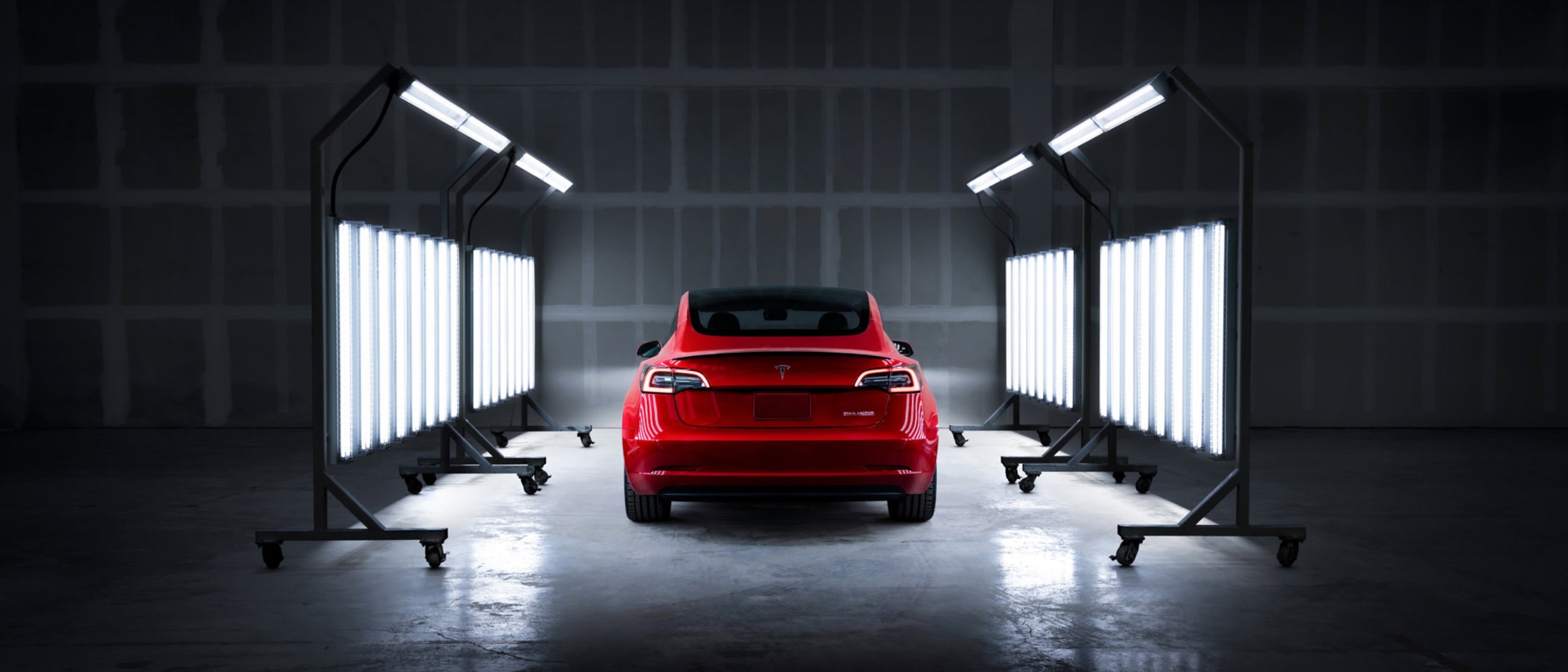 Red Model 3 in Spotlight
